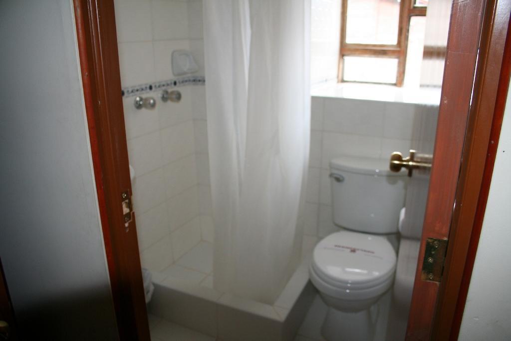 Hostal El Auqui Cuzco Habitación foto