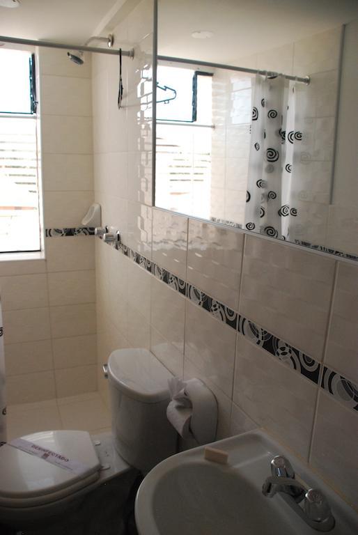 Hostal El Auqui Cuzco Habitación foto