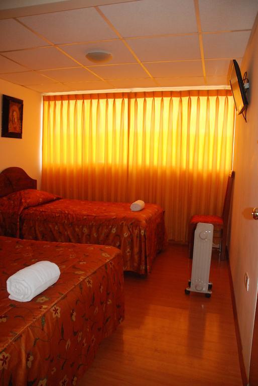 Hostal El Auqui Cuzco Habitación foto